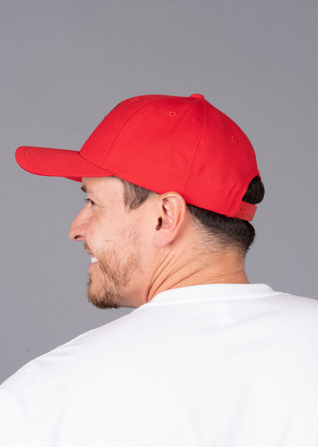 https://statefortyeight.com/cdn/shop/articles/red-flex-hat-with-main-logo-in-black-3.jpg?v=1673949733
